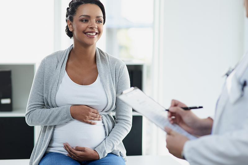 Pregnant lady at the doctor's office.